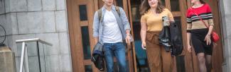Student walking from the Irving Barber Learning Centre, UBC Vancouver